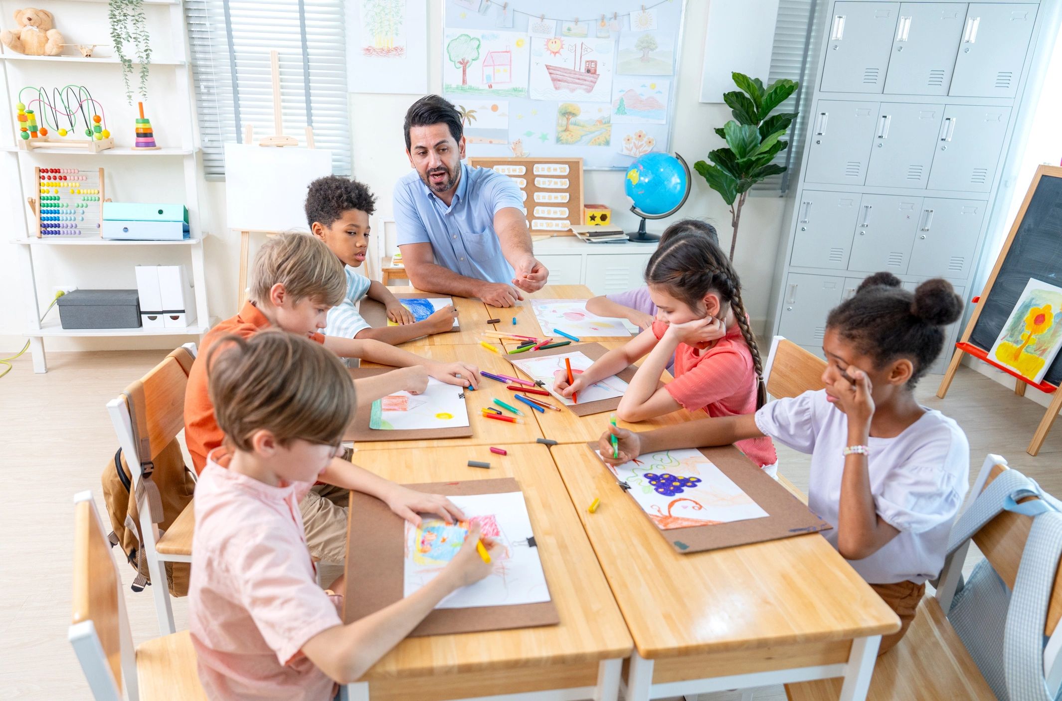 Teacher leading a classroom activity from the front of the room